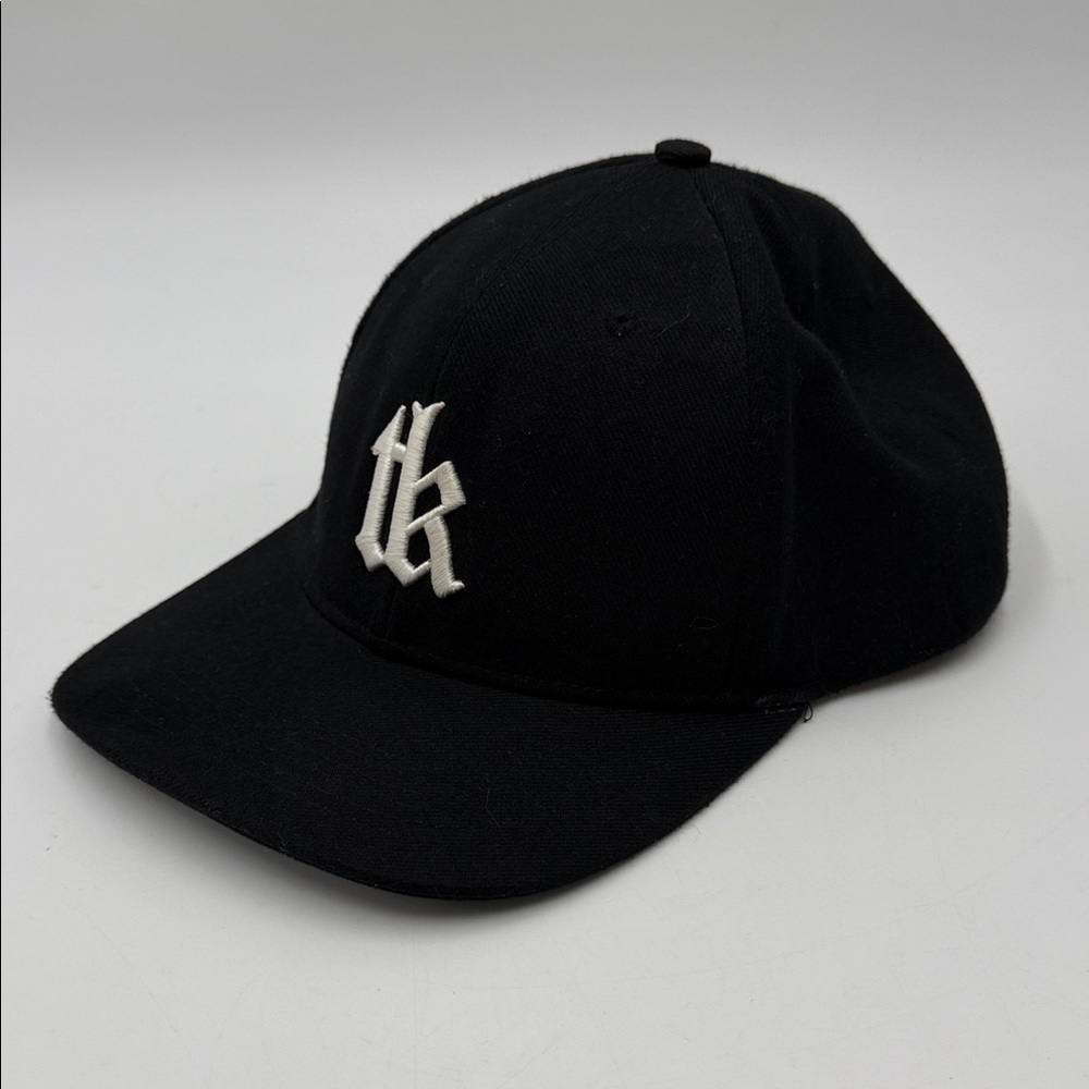 The Kooples logo baseball cap features a black colorway